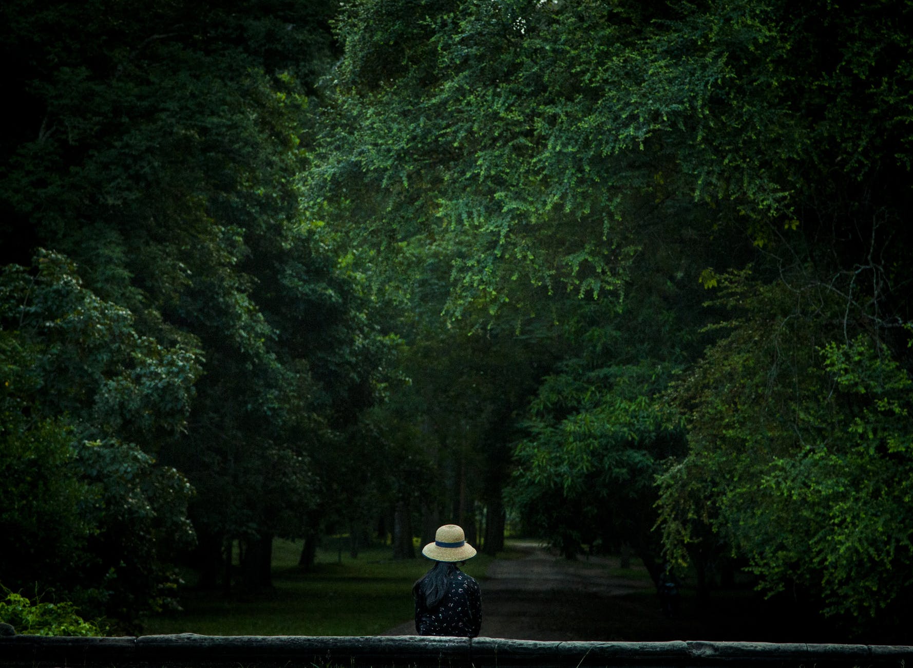 photo of woman wearing white hat